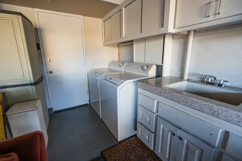 Garage laundry area with sink